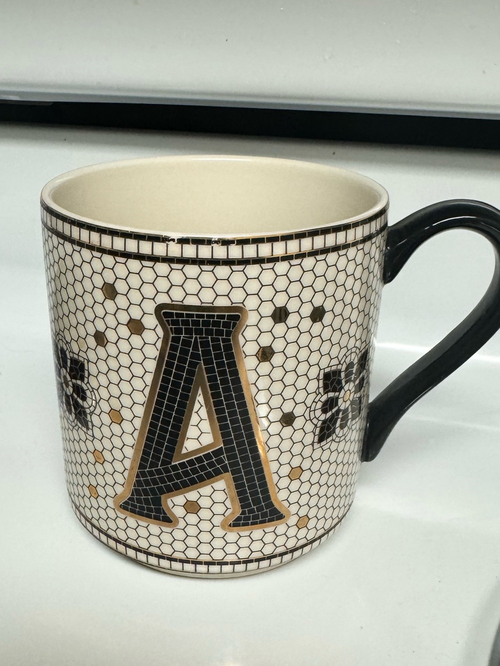Anthropologie Cream and Black Ceramic Accent Mug A